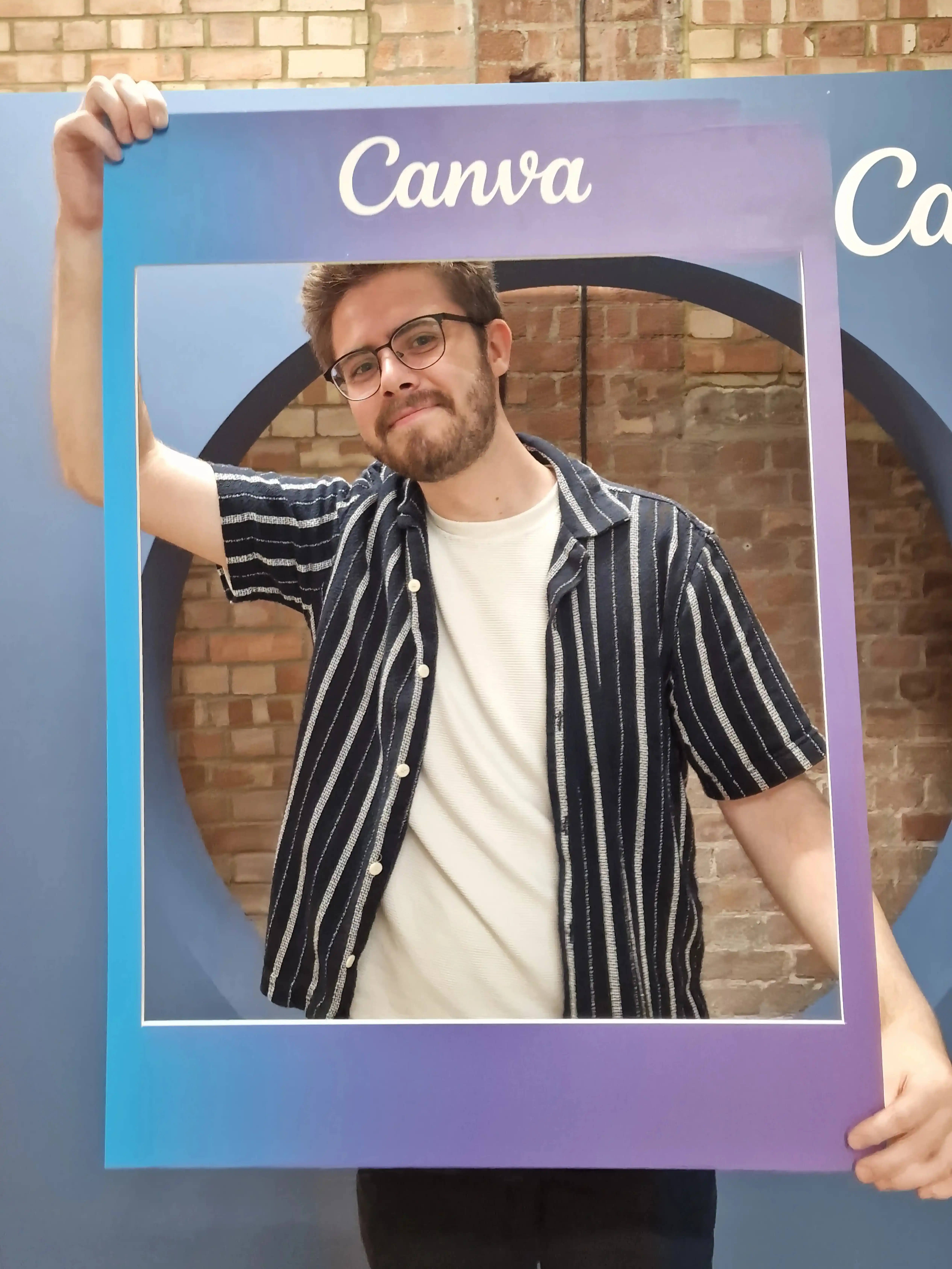 Ilya Sullivan holding Canva image border
